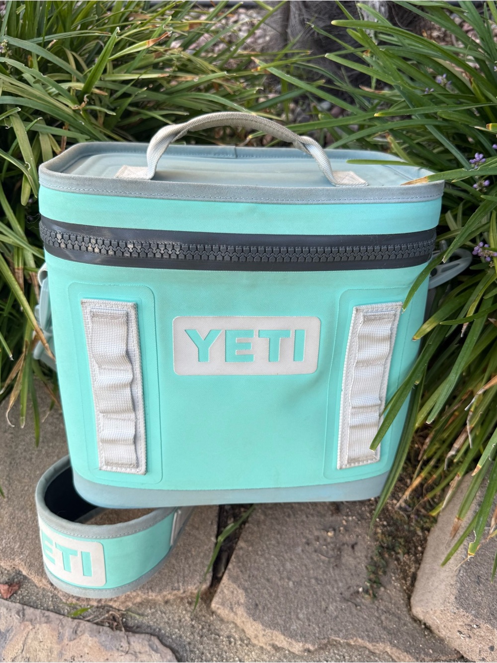 Yeti Hopper Flip 8 Seafoam green & white soft cooler with side strap.